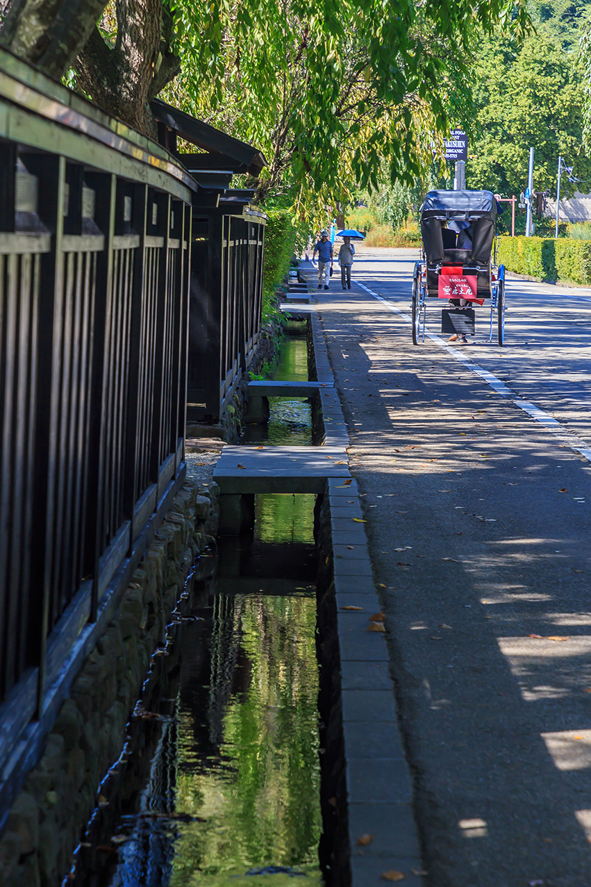 Rickshaw running along the street of Samurai Residences
