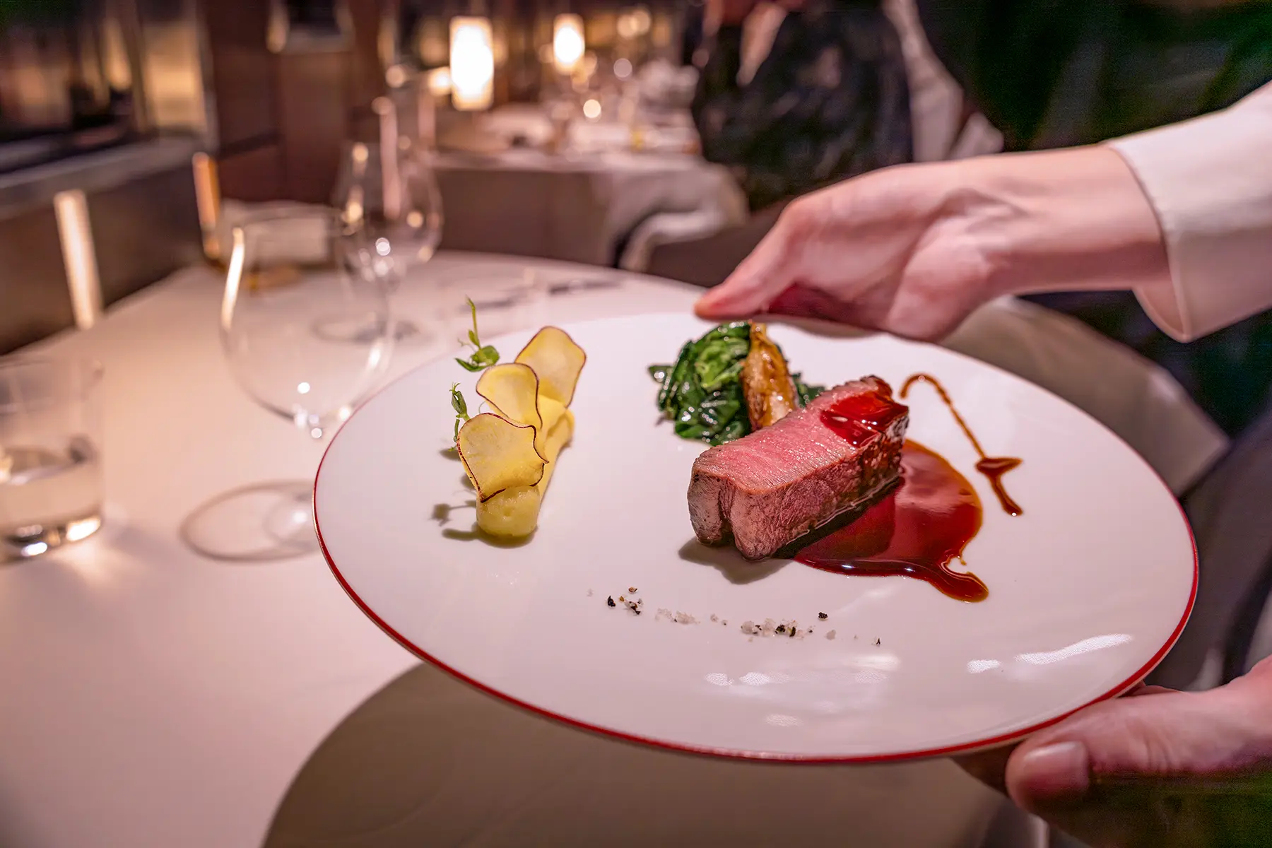 image: Executive chef of TRAIN SUITE SHIKI-SHIMA Takuya Saito